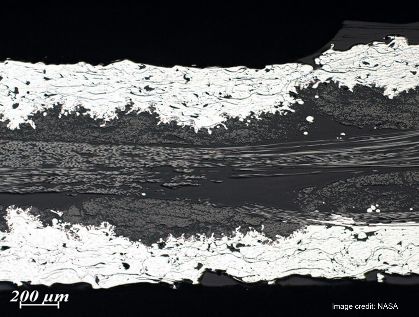 
Photomicrograph of Plasma Metal Coated Fabric. Image credit: NASA